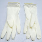 Les gants jetables blancs d'examen de latex saupoudrent libre pour l'usage médical lissent